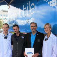 Sen. Miramant with MouthMobile volunteers