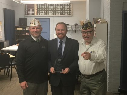 Photo of Jabaut, Sen. Libby holding award, and DeWitt 