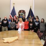 Gov. Mills signs Sen. Curry bill to expand access to banking services for young adults