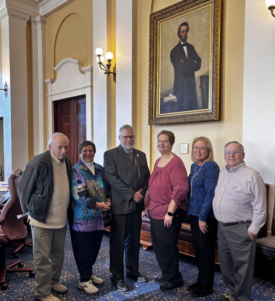 (From left to right) Allan Phinney, Doris Poland, Sen. Nangle, Lori Poland, Linda Parenteau, and Steve Parenteau, shortly after Sen. Nangle took the oath of office on Swearing-In Day for the 132nd Legislature.