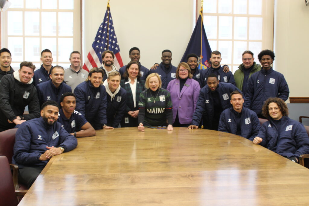 Sen. Pierce, Rep. Kuhn, Gov. Mills, and the Hearts of Pine in the Governor's Cabinet Room